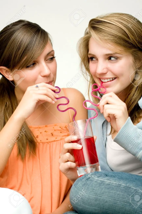 26259313-girls-sharing-a-glass-of-drink.png