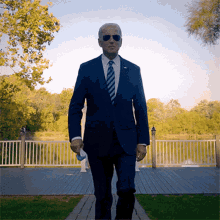 walking-with-eagle-joe-biden.gif.9548c0a80dfca2dd4f2e447b497d3c28.gif