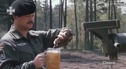 beer-on-speeding-tank-39-s-cannon.gif
